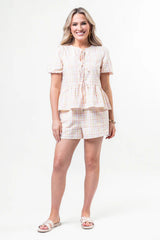 Tell Your Story Multi Gingham Short Sleeve Tie Front Peplum Blouse