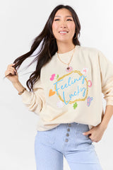 Feeling Lucky Sweet Cream Oversized Graphic Sweatshirt